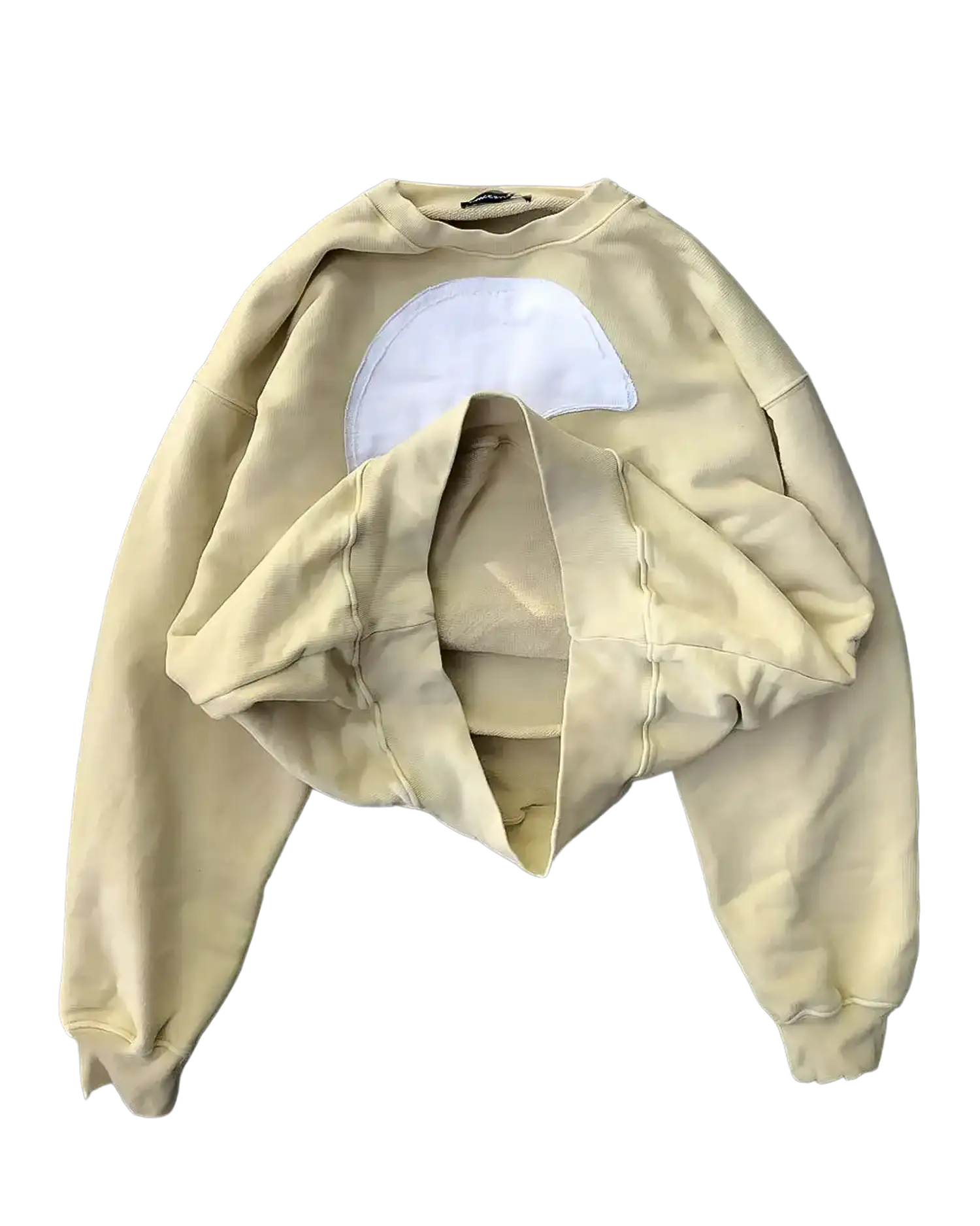 Beige oversized hoodie flat lay revealing interior lining and semi-circular chest appliqué